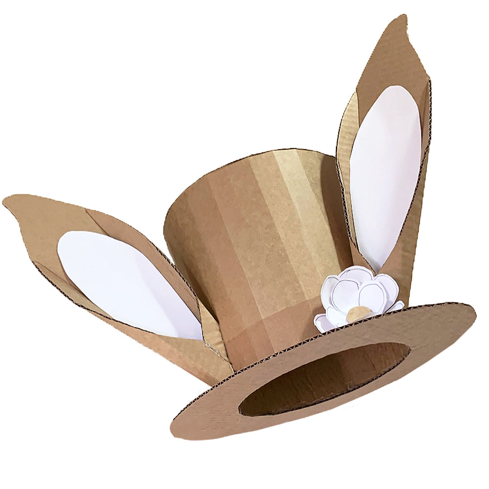 Cardboard top hat with rabbit ears and a flower on a white background