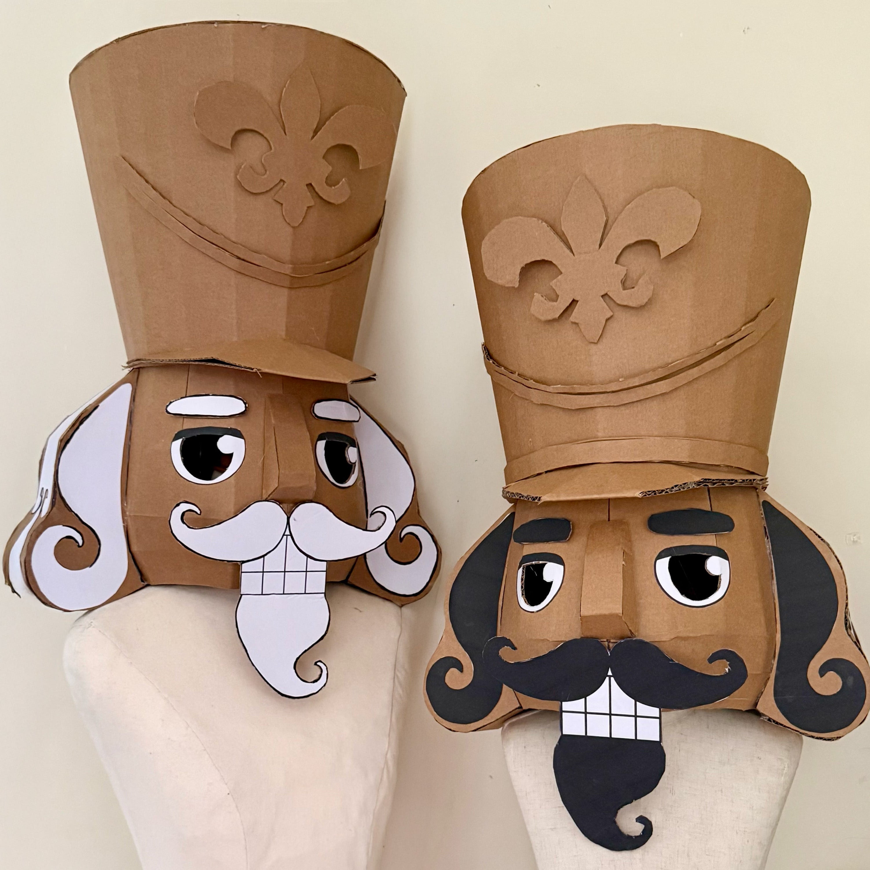 Two styles of DIY Cardboard nutcracker costumes with white background