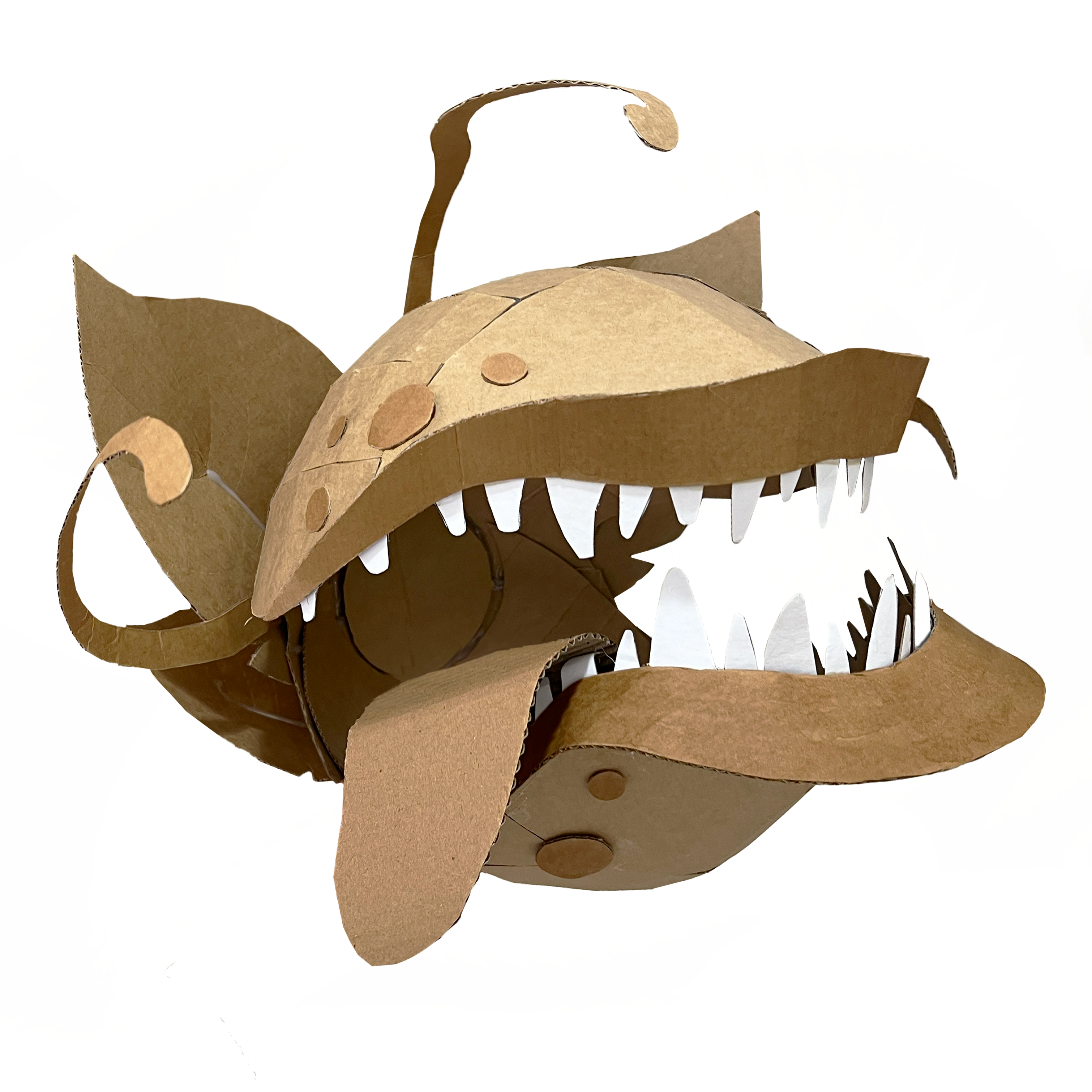 Cardboard man-eating plant costume with open mouth on a white background inspired by rocky horror show